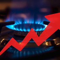 Gas cooker flame with an upward arrow illustrating rising gas prices in Spain.
