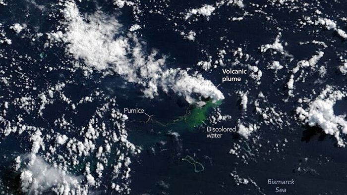 Satellite image showing an underwater volcanic eruption in the Bismarck Sea, with a volcanic plume, floating pumice and discoloured water visible near Papua New Guinea.