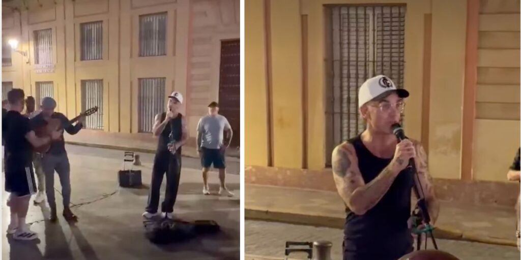 Robbie Williams stuns passers-by with surprise street performance in Seville