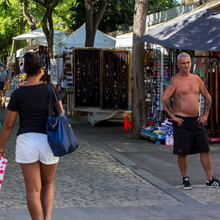 Tourist strips off in heat.