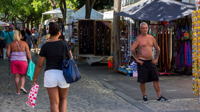 Tourist strips off in heat.