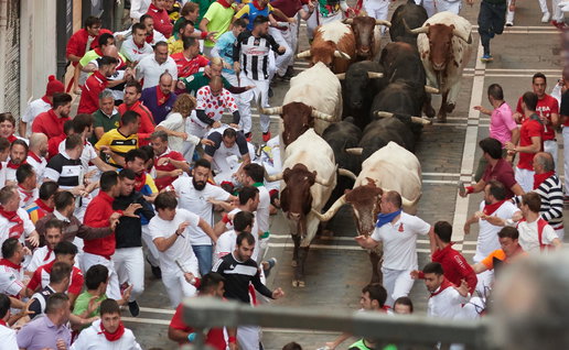 San Fermines Festival where people run in front of the bulls in the streets of the city