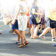 Pedestrian crowd crossing street