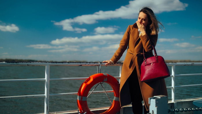 Seasick woman on a cruise.