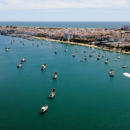 Air view of the port and town of Puerto Umbria in Huelva