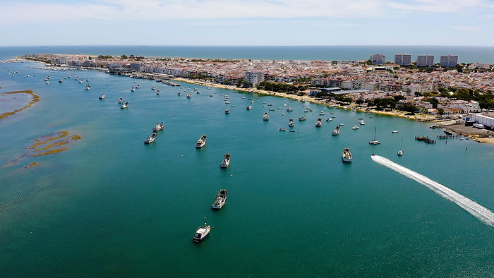Air view of the port and town of Puerto Umbria in Huelva