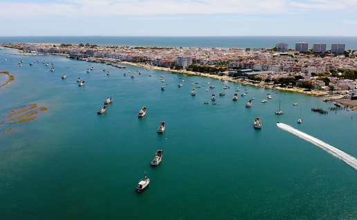 Air view of the port and town of Puerto Umbria in Huelva