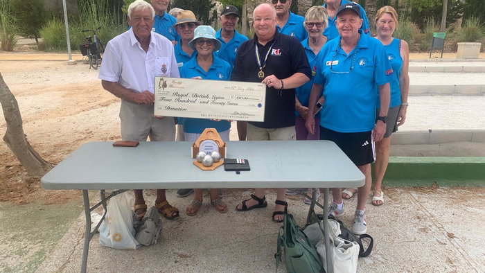 Benijofar petanca club raises €420 for Royal British Legion through handmade ball holders.