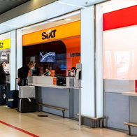 Car hire firms at airport.