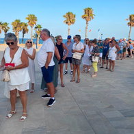 People line in a Queue at Orihuela beach