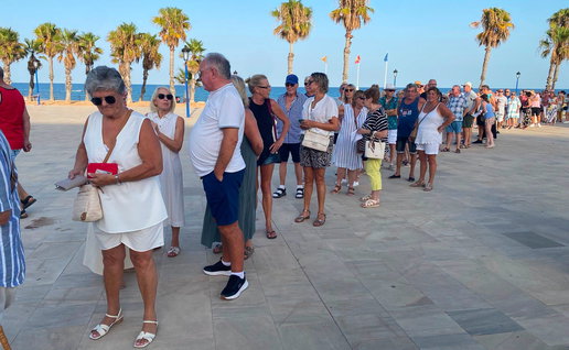 People line in a Queue at Orihuela beach