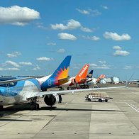 Airplanes on runway at Bristol Airport.