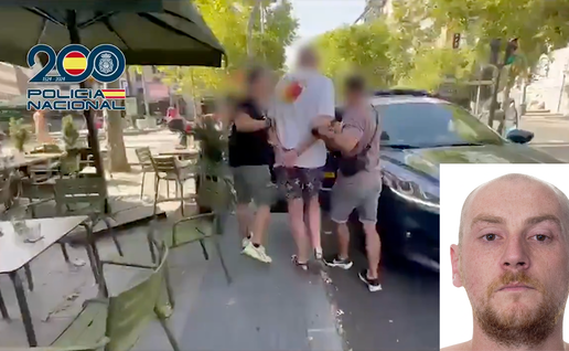 Spanish officers escort British fugitive John Rocks following his arrest in central Madrid on August 1.