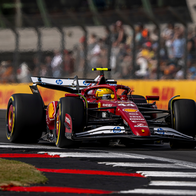 Formula 1 car races around the track.