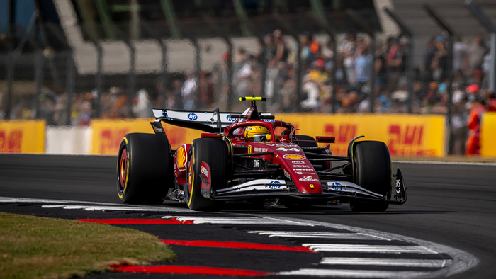 Formula 1 car races around the track.