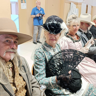 Guests dressed up in old western attire at the Garrucha Cultural Centre during the town's western film night.