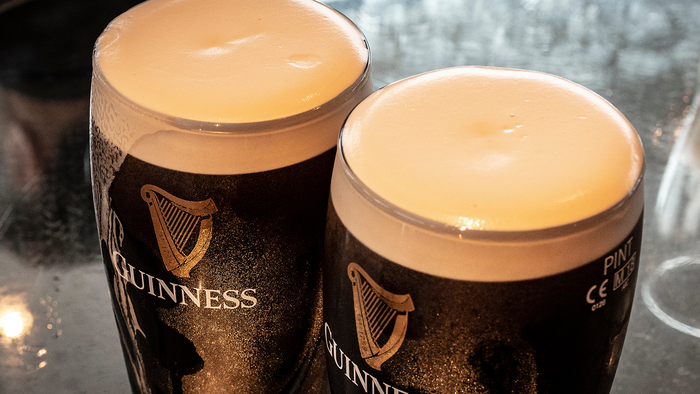 Two fresh pints of Guiness.
