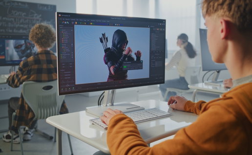 Close up of a young person on a screen developing a 3D gaming character