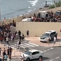 Thousands of immigrants flood Spanish gates in Ceuta in July.