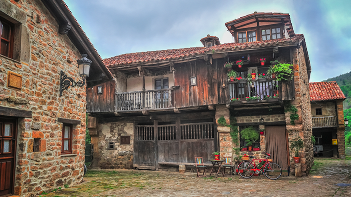 An old stone building in a rural village in northern Spain