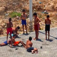 Young Moroccan boys playing in the street