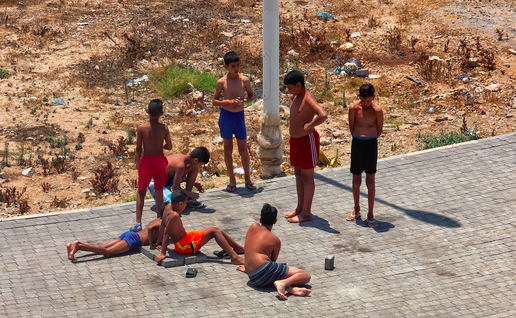 Young Moroccan boys playing in the street