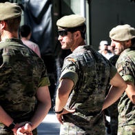 Three Spanish soldier standing next to each other