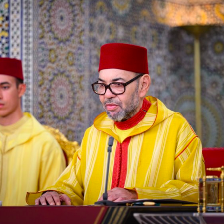 King Mohammed VI with the crown prince during a religious ceremony