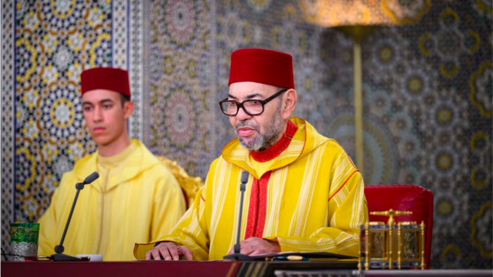 King Mohammed VI with the crown prince during a religious ceremony
