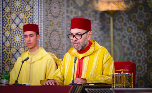 King Mohammed VI with the crown prince during a religious ceremony