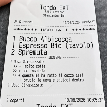 A photo of a restaurant receipt in Italian