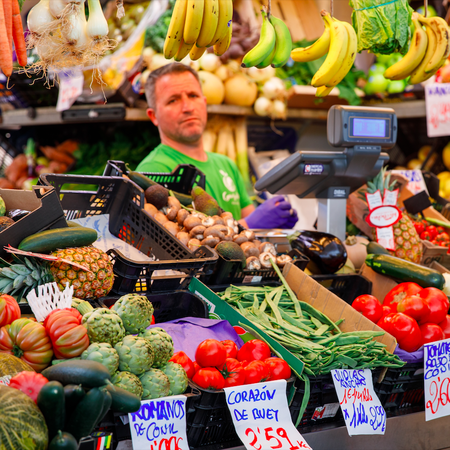 A fruit and vegetable stall in a Spanish market