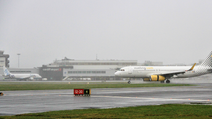 Vueling aircraft on the tarmac in front of Cardiff Airport.