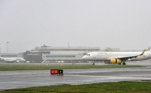 Vueling aircraft on the tarmac in front of Cardiff Airport.