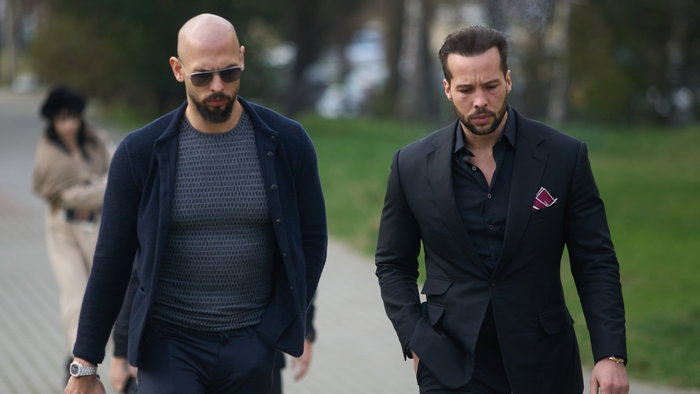 Andrew and Tristan Tate walking together as lawyers challenge claims about their luxury lifestyle Title: Andrew and Tristan Tate luxury lifestyle claims