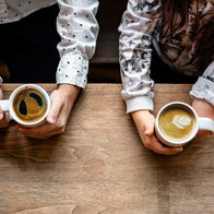 Friends sharing a coffee.