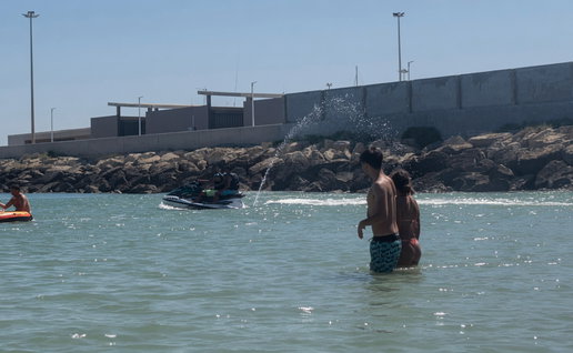 A jet skier in a bathing area on popular Spanish beach