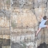 Dangerous moment tourist gets trapped