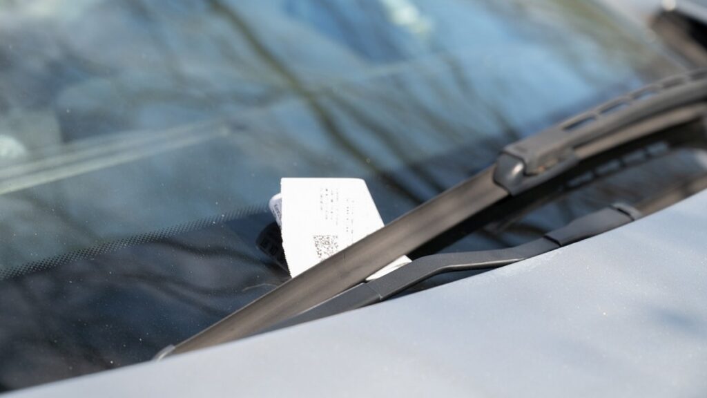 Drivers in a quiet Belgian neighbourhood confused by mysterious fines tucked under their wipers for days