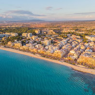 Aerophotography view from flying drone of El Arenal Beach in Mallorca.