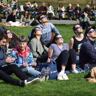 Group gathers to watch the eclipse.