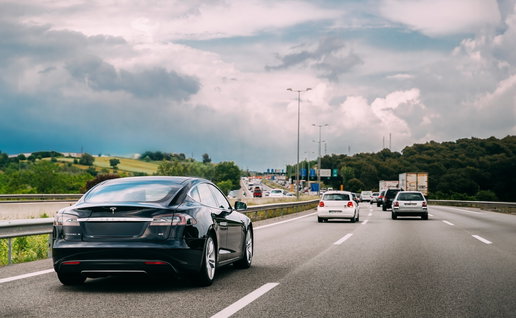 Cars driving fast on motorway