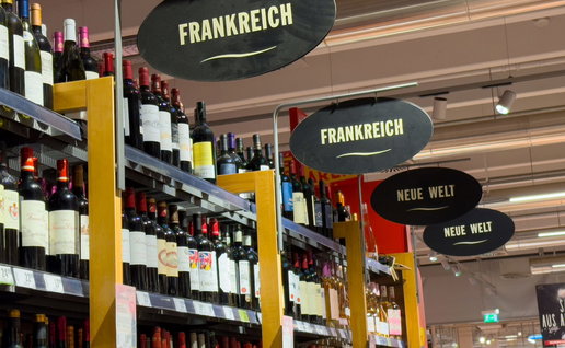 Rows of European wines in the beverage section of an Austrian Supermarket
