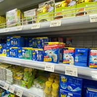 Shelves in supermarket stocked with citronella products