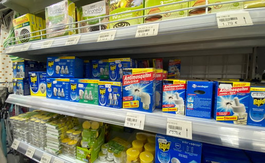 Shelves in supermarket stocked with citronella products