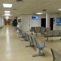 An empty waiting room inside of a doctors surgery in Spain