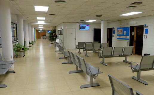 An empty waiting room inside of a doctors surgery in Spain