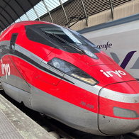 Iryo train boarding passengers in Malaga.