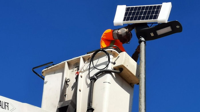 Estepona workers install new lights.