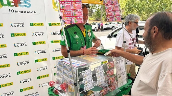 ONCE seller Gabriel Fernández at his stand in Vegas del Genil.